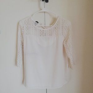 Cute White top with bow in the back